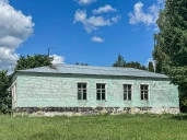 Имущественный комплекс в составе земельного участка общей площадью 11 618 кв.м. и 8 зданий и сооружений общей площадью 983,5 кв.м.